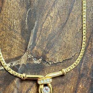 Elegant Gold Necklace with Crystal Pendant